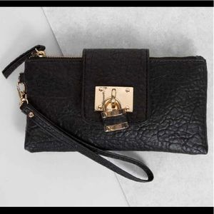 Black wristlet clutch wallet with gold hardware